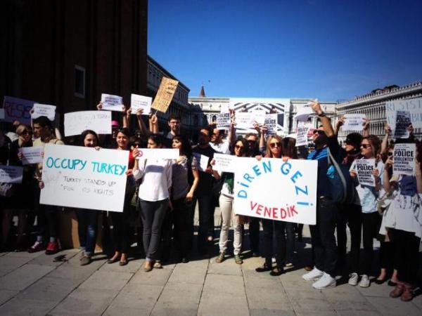 Protesters at a solidarity rally in Venice during the Venice Biennale included Turkish pavilion artist Ali Kazma, Turkish pavilion curator Emre Baykal, curator Beral Madra, Istanbul biennial curator Fulya Erdemci, Witte de With director Defne Ayas, and others.